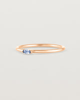 Angled view of the Vega Stacking Ring | Sapphire in rose gold.