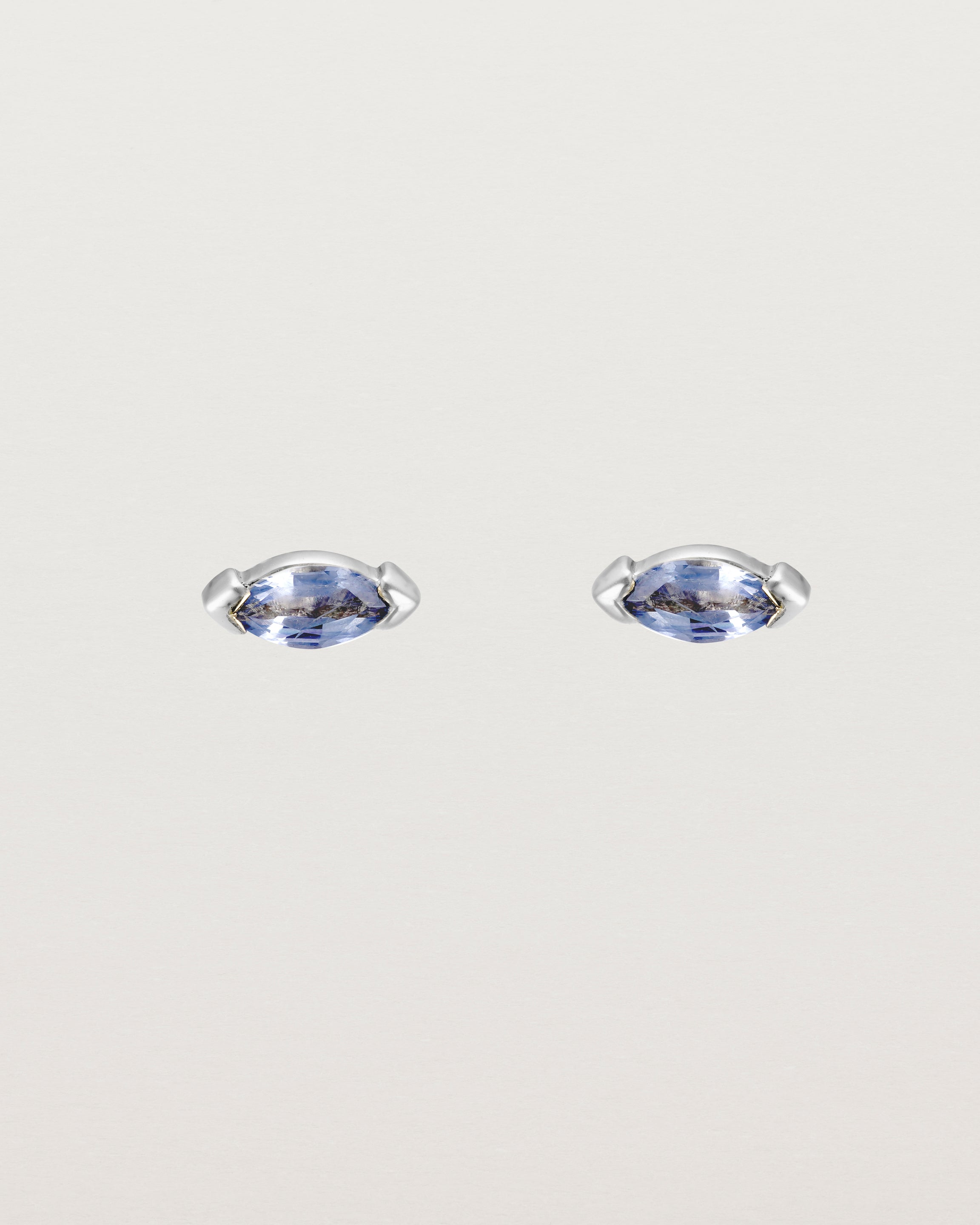Front view of the Vega Studs | Sapphire in white gold.