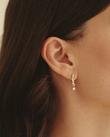 video of model wearing the ember diamond earrings
