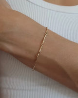 Video of model wearing chain bracelet