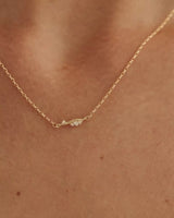 Video of Ember Charm Necklace being worn in yellow gold.
