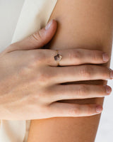 Silver Agate Ring on womans pointer finger.