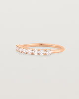 Rose Gold Diamond ring featuring seven white diamonds
