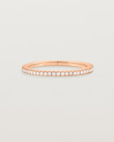 rose gold band with half a band of micro pave diamonds