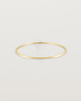 Front view of the Antares Bangle in Yellow Gold.