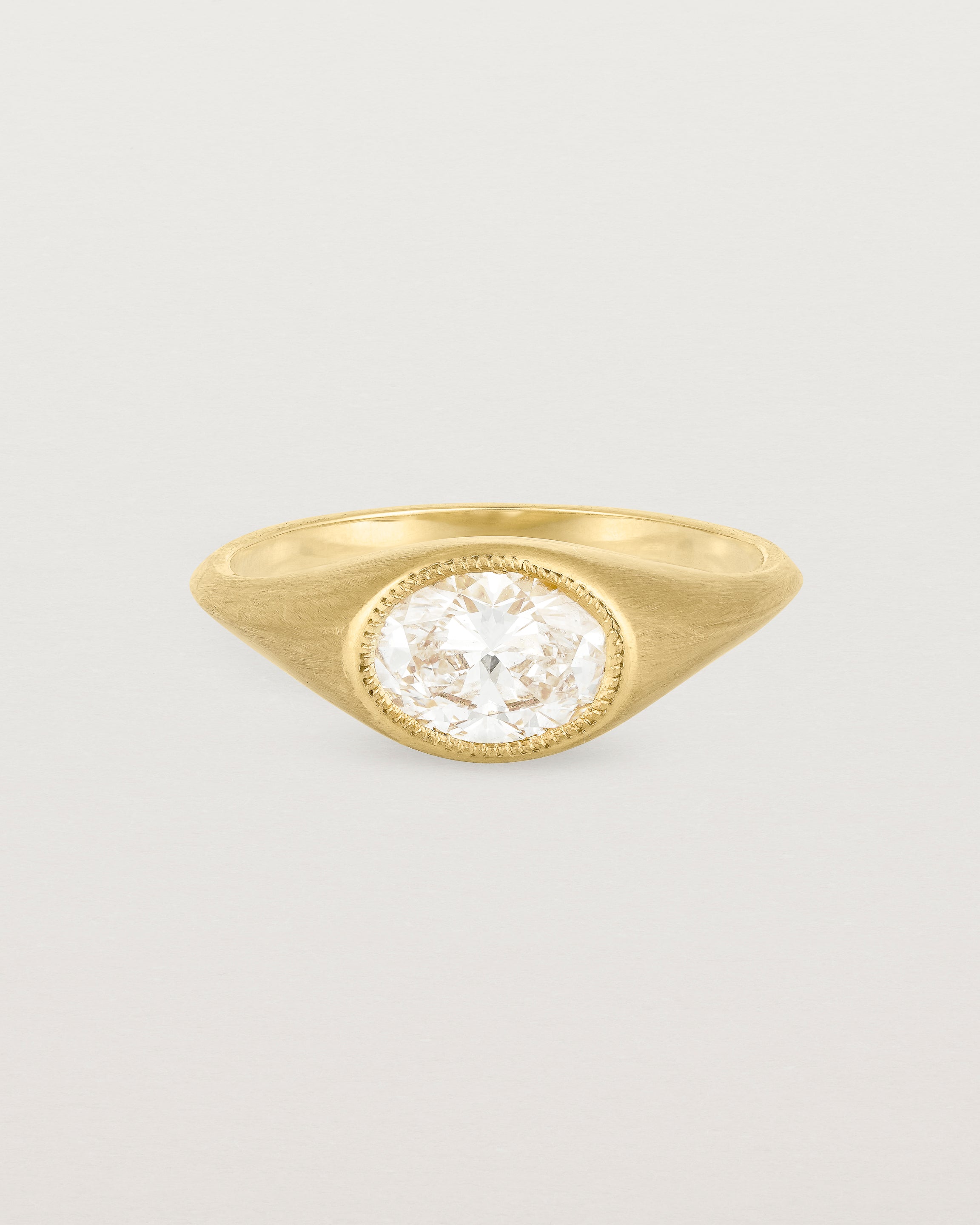 Front view of the Átlas Oval Signet | Laboratory Grown Diamond in yellow gold, with a matte finish. _label: Matte Finish Example