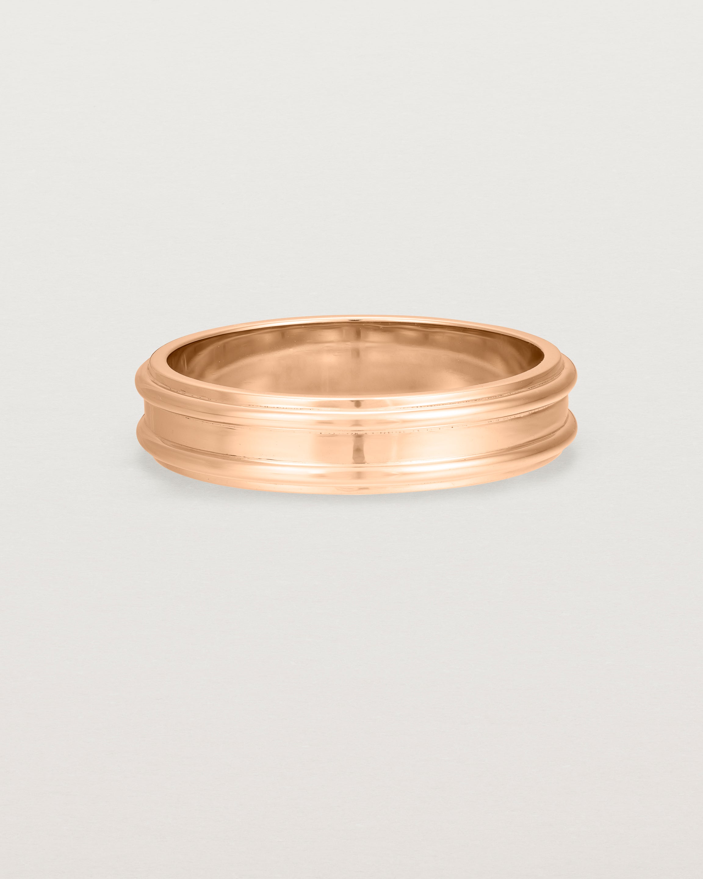 Front view of the Border Wedding Ring | 5mm | Rose Gold.Front view of the Border Wedding Ring | 5mm | Rose Gold.