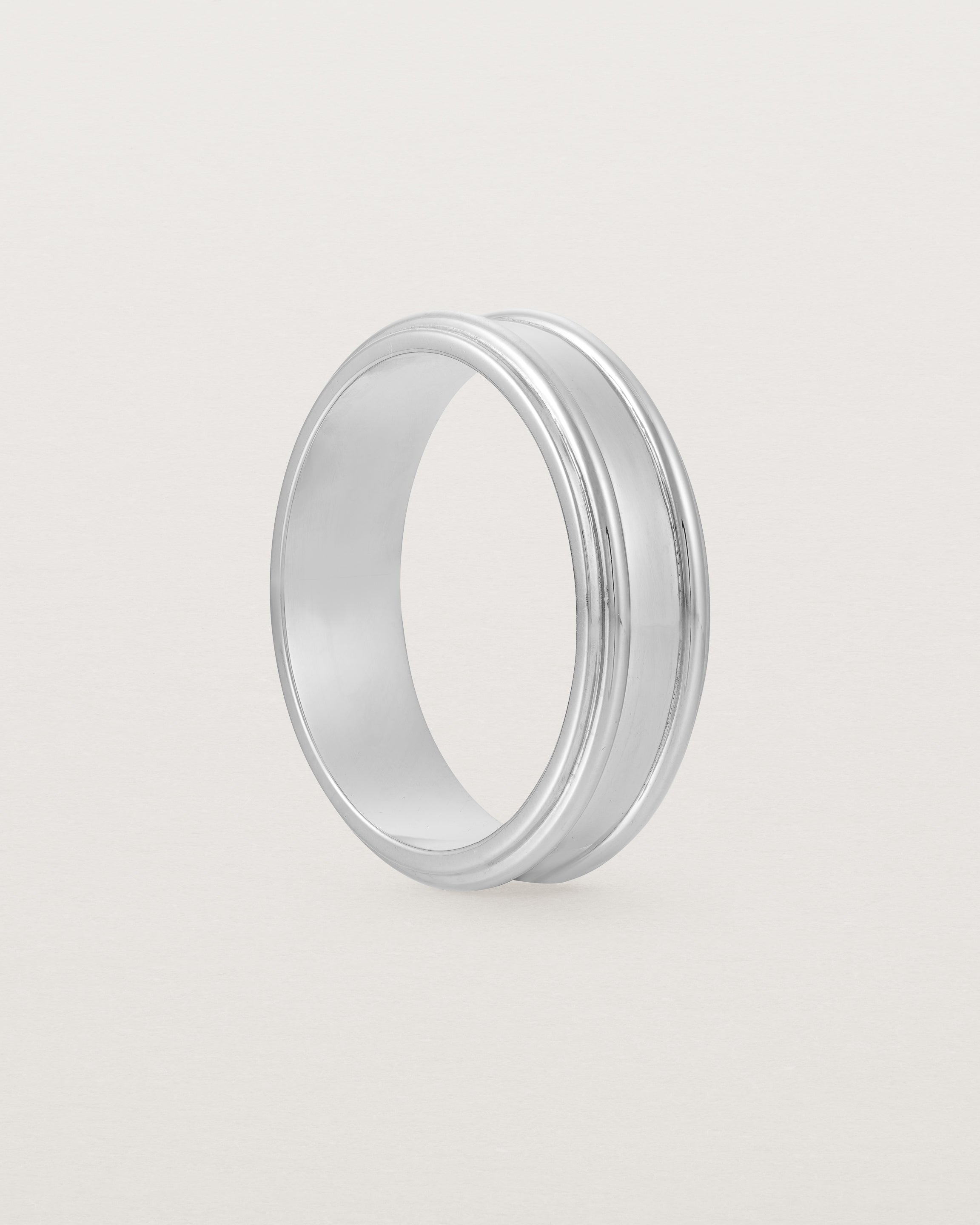 Standing view of the Border Wedding Ring | 6mm | White Gold.