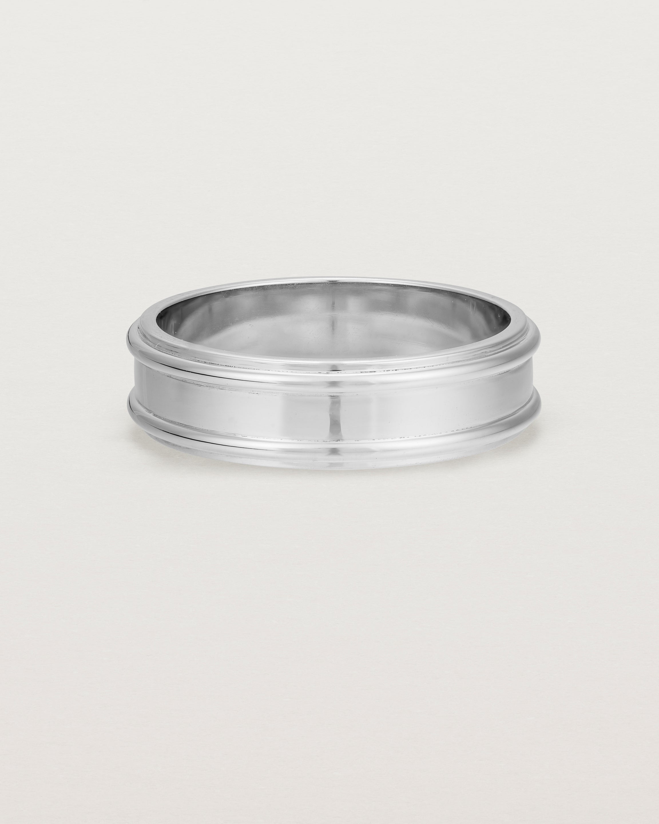 Front view of the Border Wedding Ring | 6mm | White Gold.