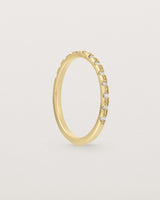 Standing View of Cascade Square Profile Wedding Ring | Diamonds | Yellow Gold