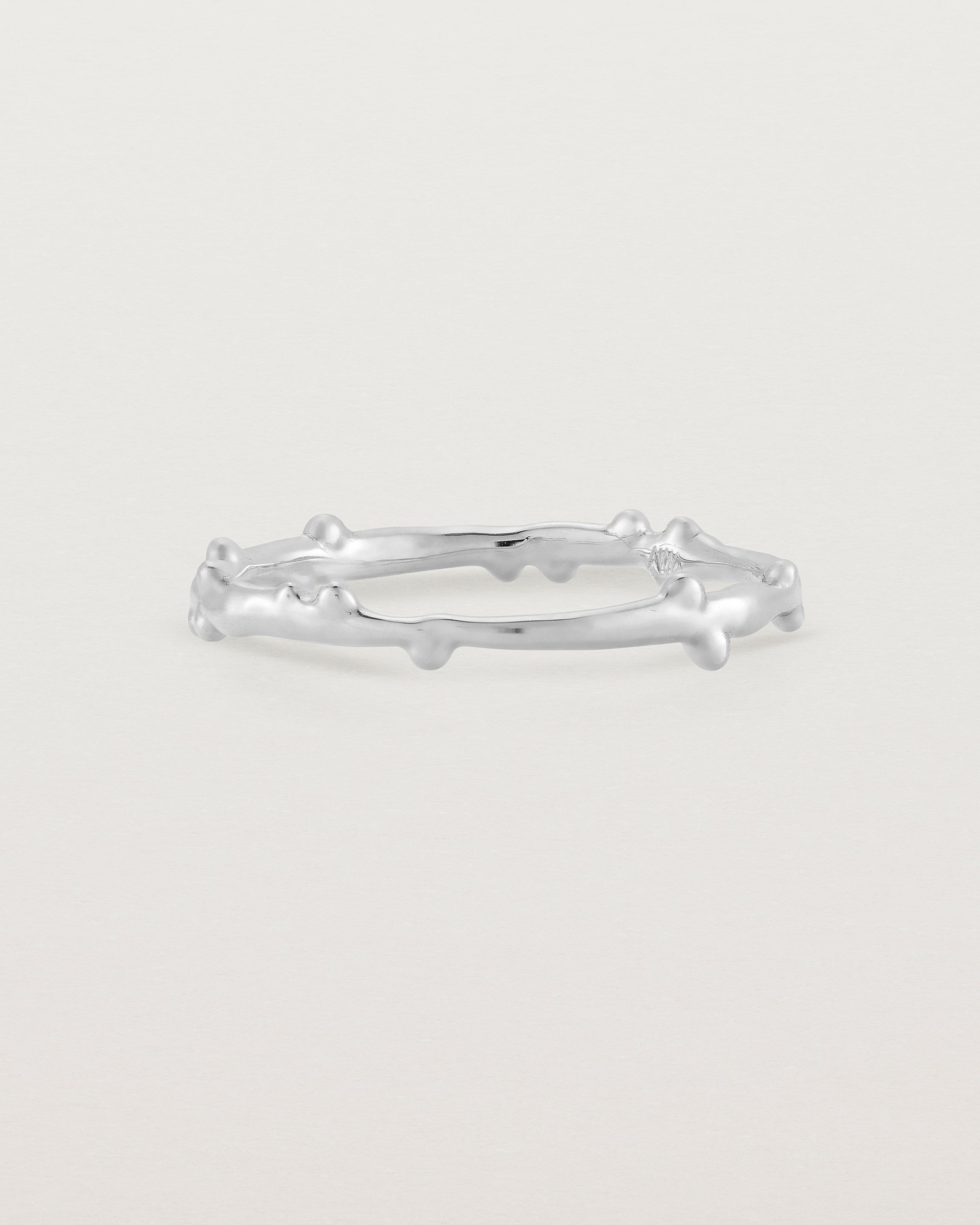 The Dotted Organic Stacking Ring in Sterling Silver.