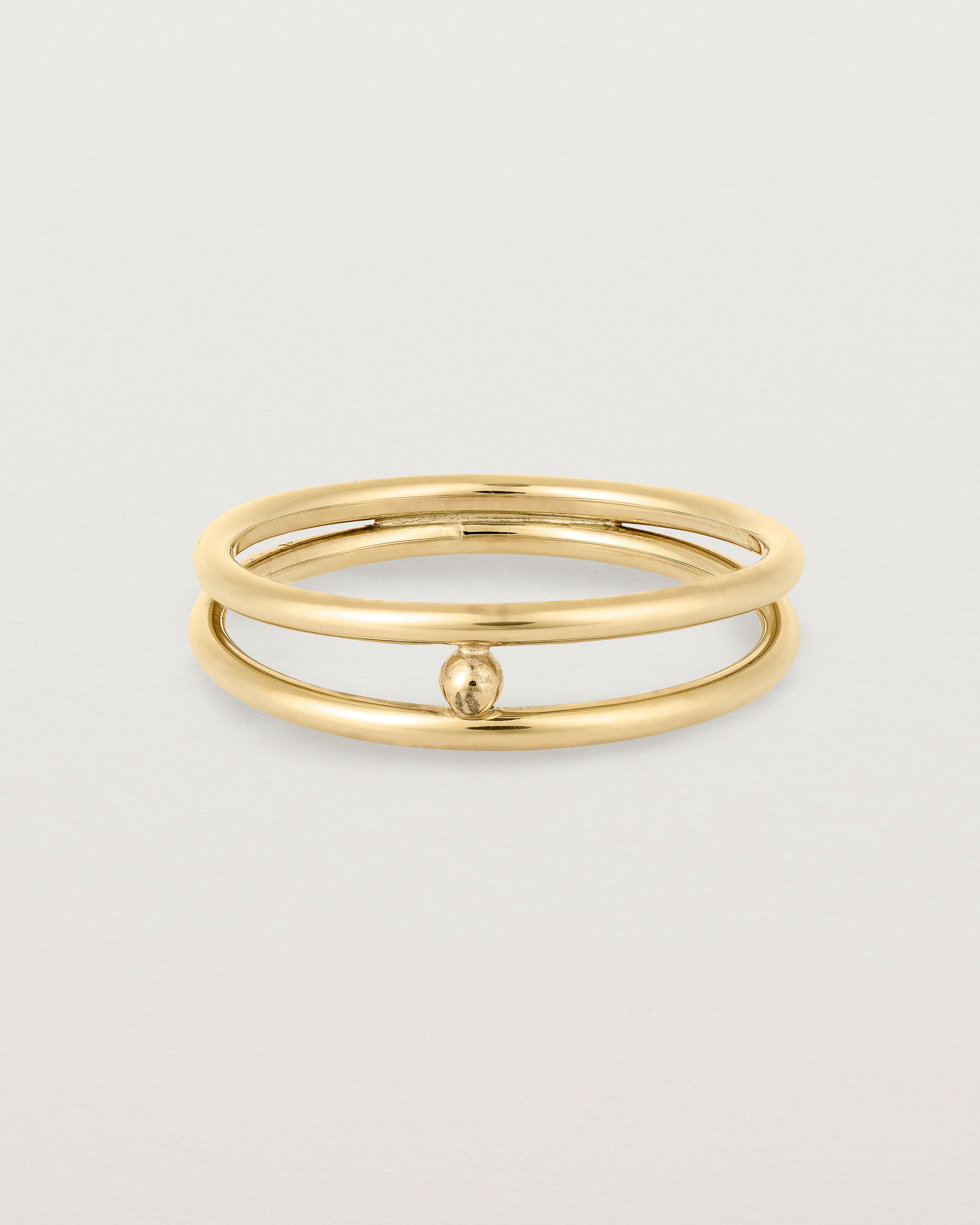Front view of the Double Reliquum Ring in Yellow Gold.