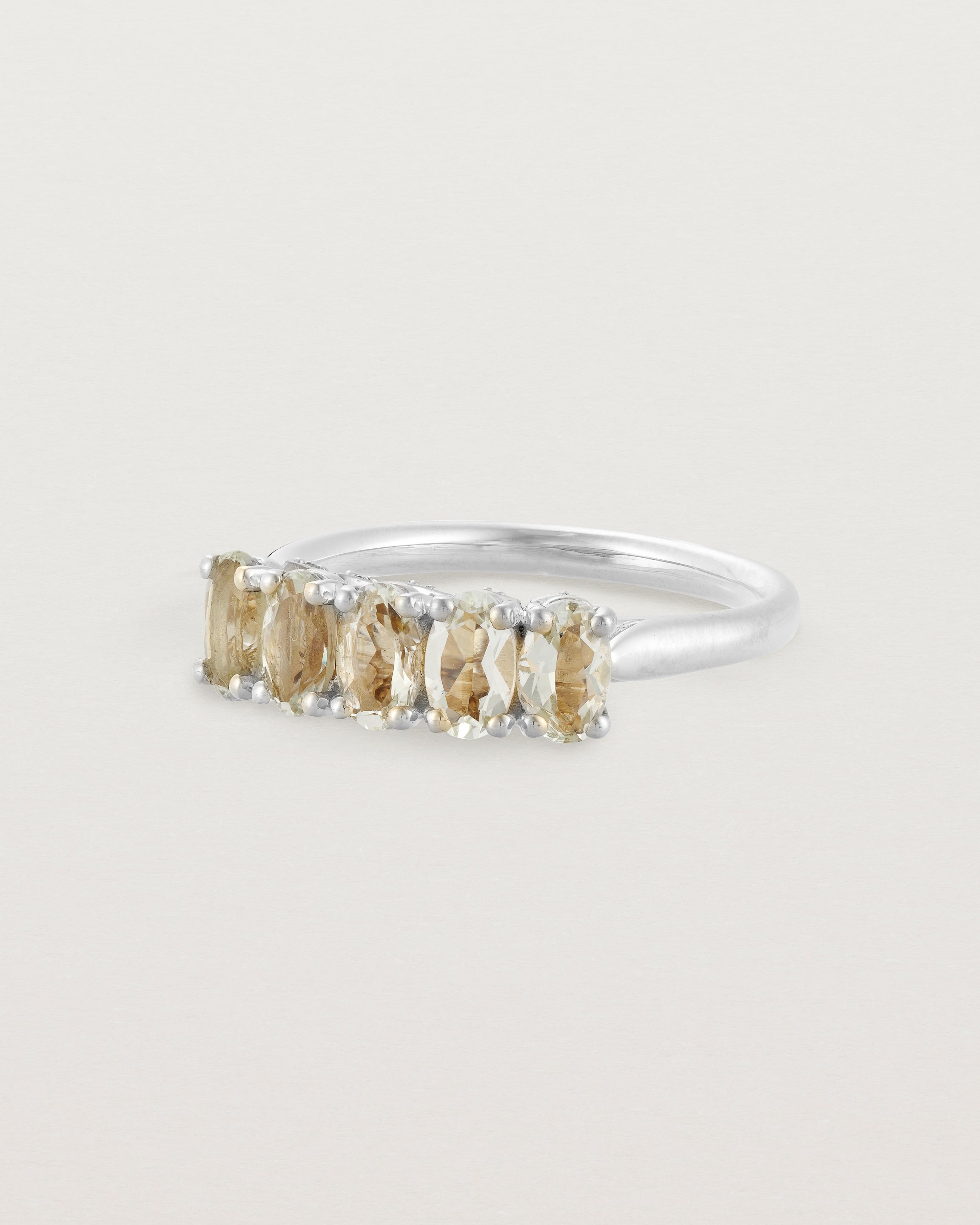 Standing view of the Fiore Wrap Ring | Green Amethyst | White Gold.