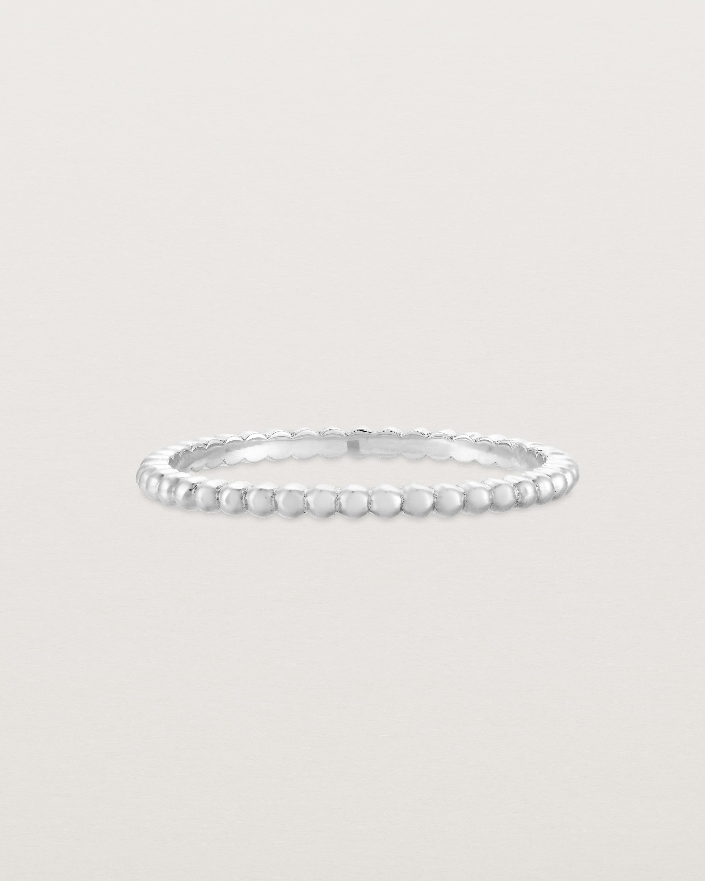 Front view of the Dotted Stacking Ring in Sterling Silver.