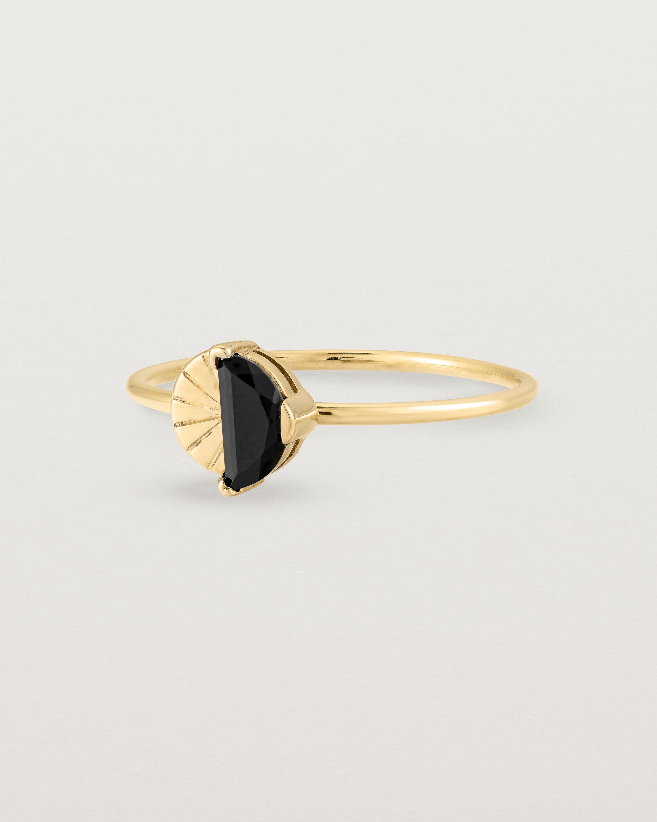 Angled view of the Jia Stone Ring | Black Spinel in Yellow Gold.