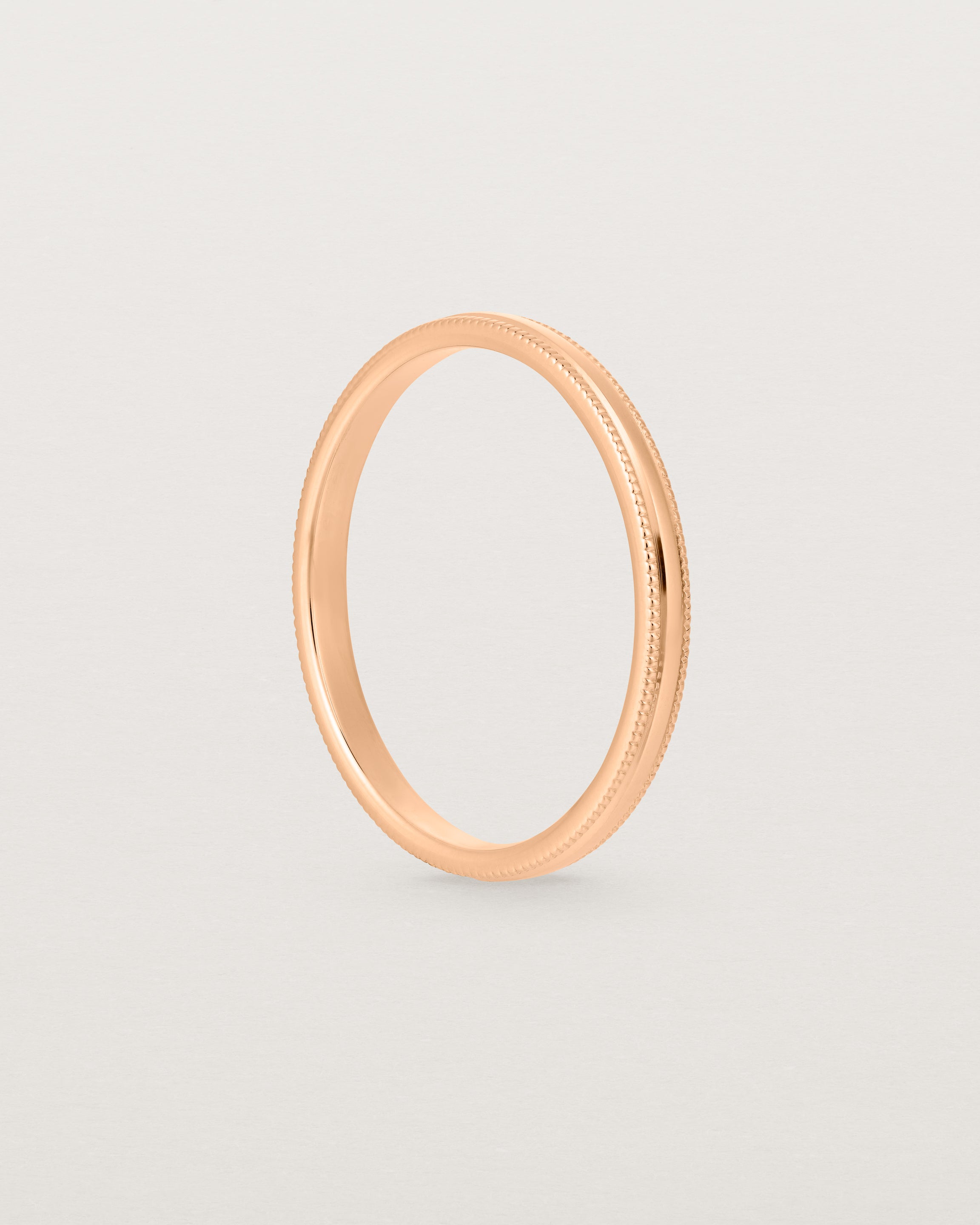 Standing view of the Millgrain Wedding Ring | 2mm in Rose Gold.
