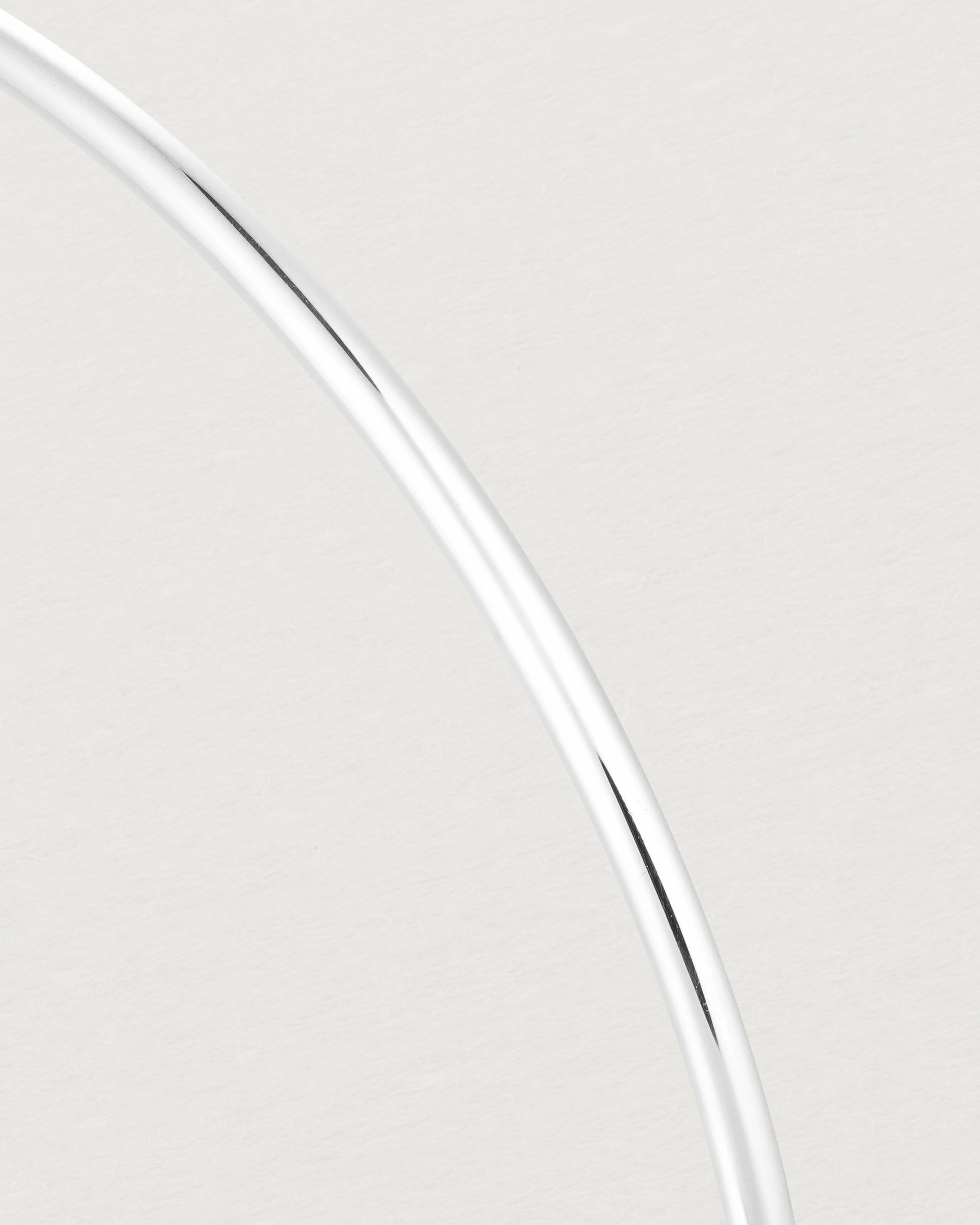 Close up of the detail of the Oval Bangle in Sterling Silver.