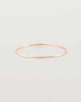 Front view of the Oval Bangle in Rose Gold.