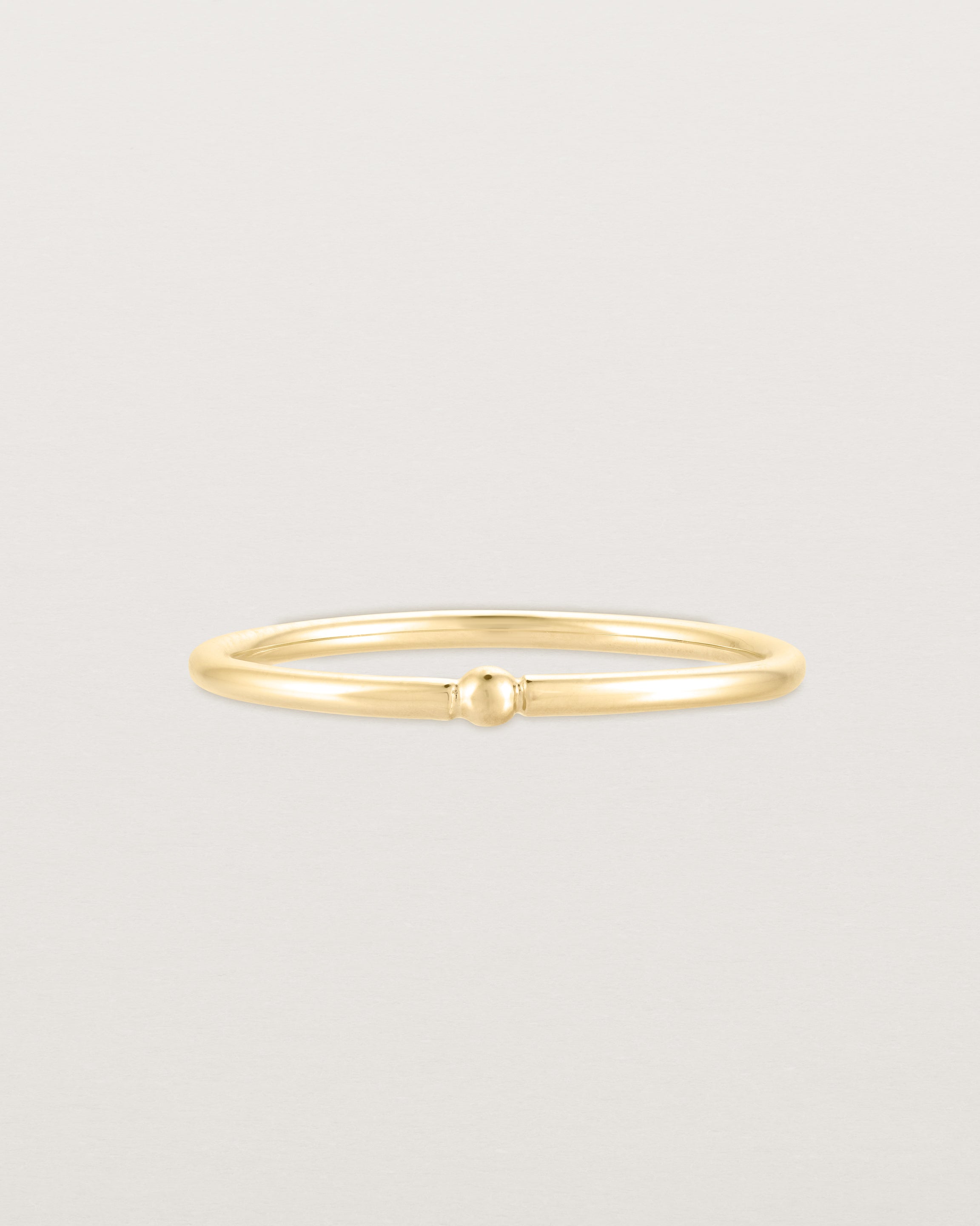 Front view of the Suspend Ring in Yellow Gold.