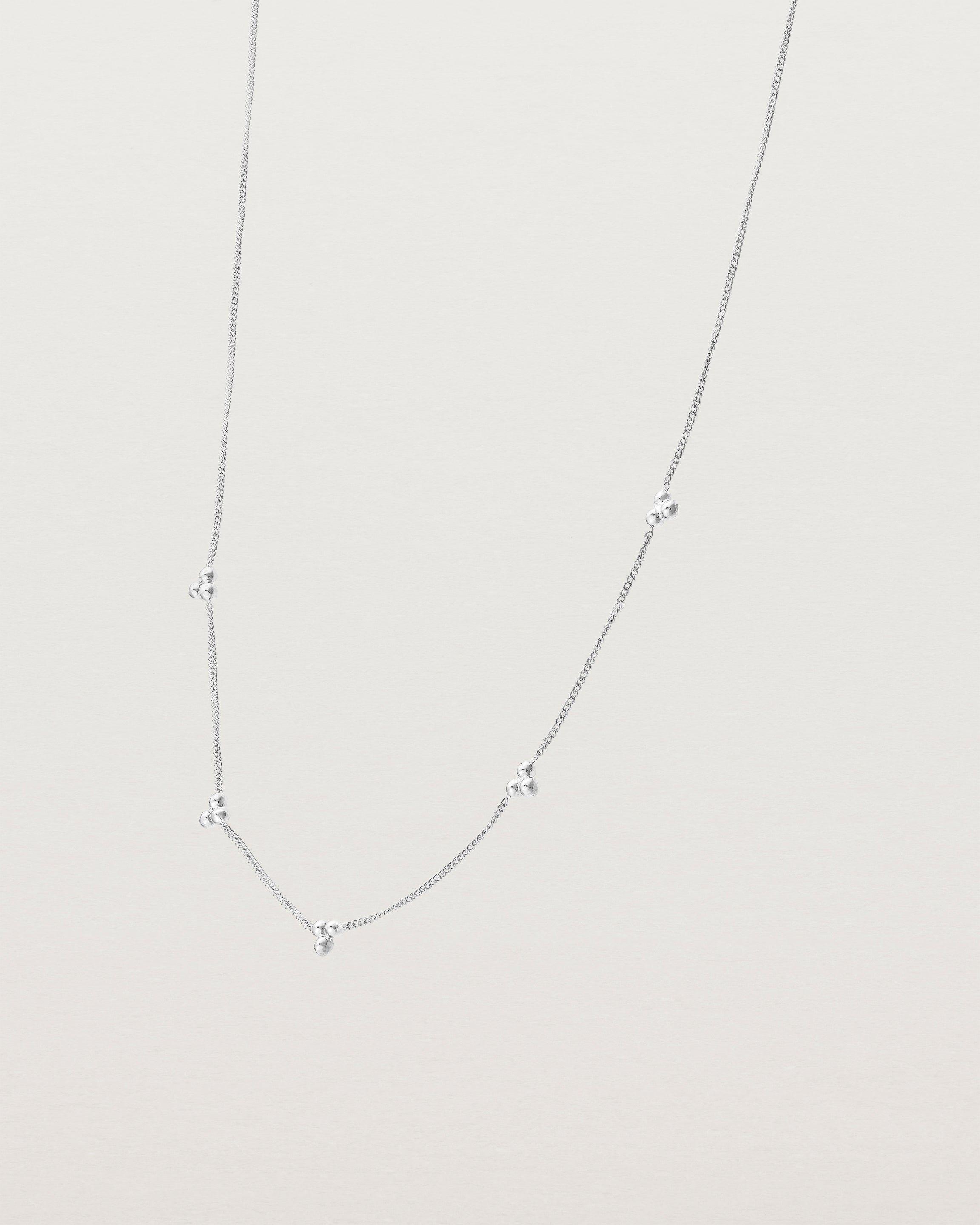 Angled view of the Tellue Necklace in sterling silver.