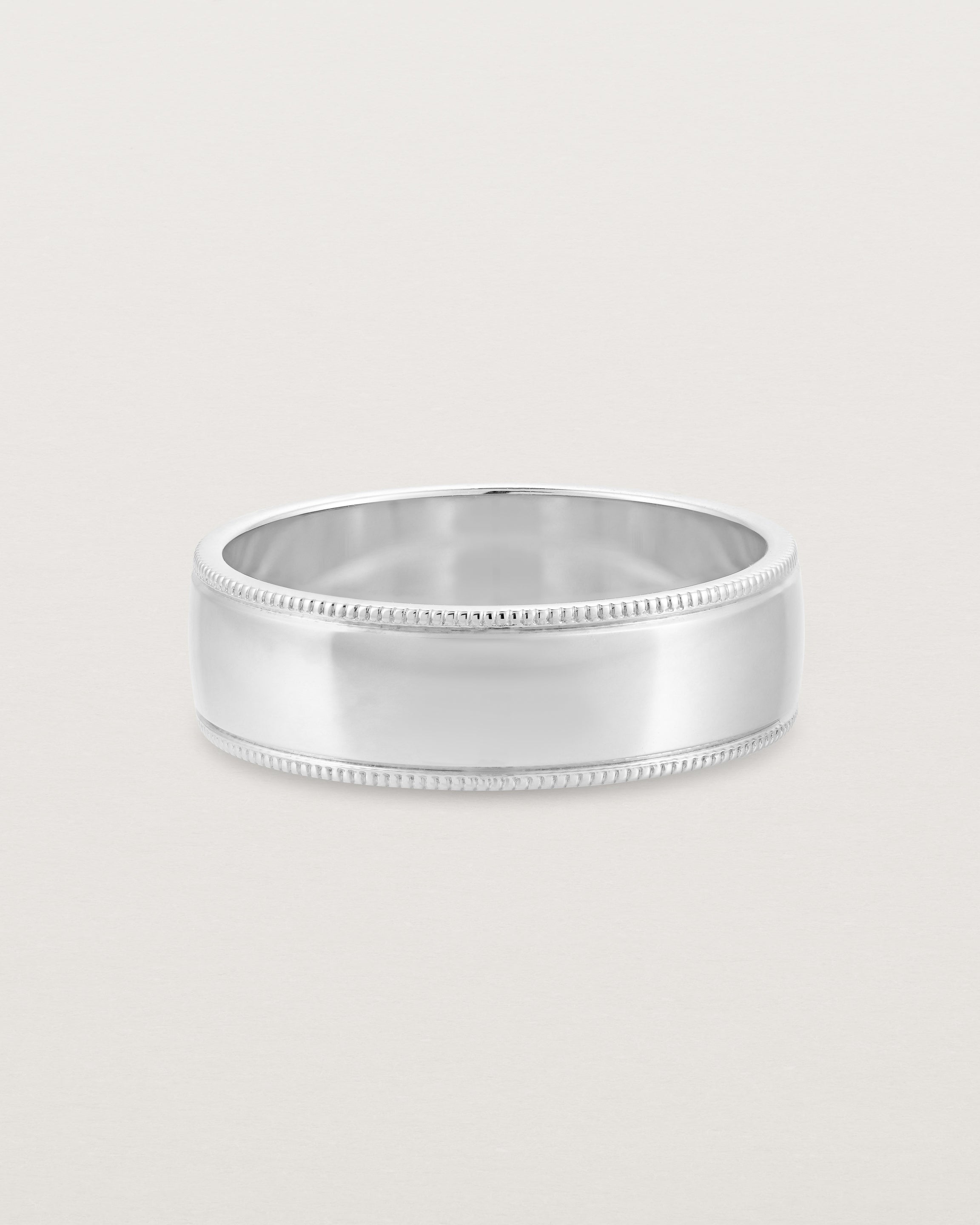 Front view of the Millgrain Wedding Ring | 6mm in White Gold.