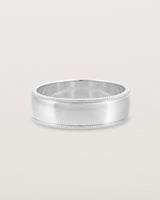 Front view of the Millgrain Wedding Ring | 6mm in White Gold.