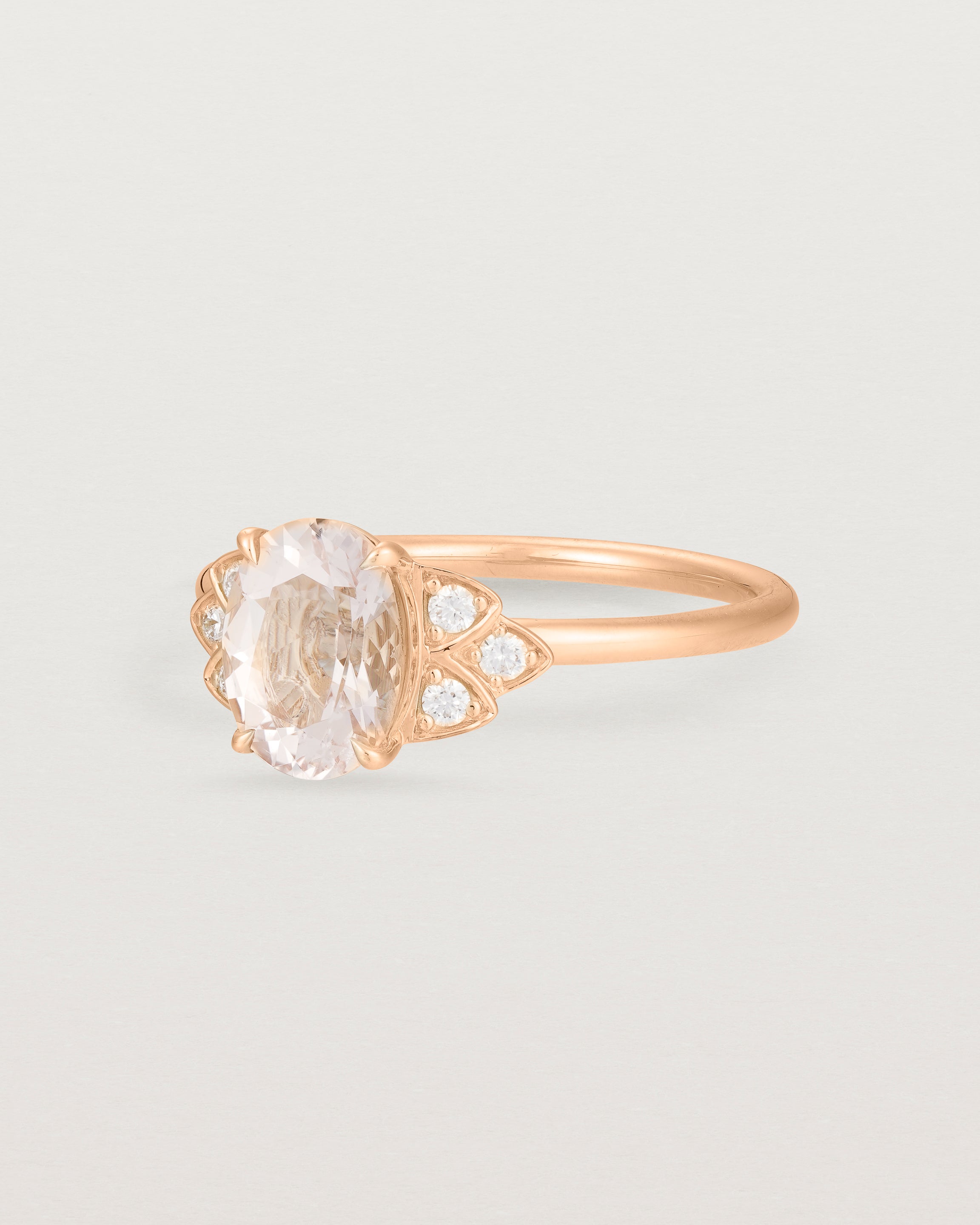 Angled view of the Winnie Ring | Morganite & Diamonds | Rose Gold.