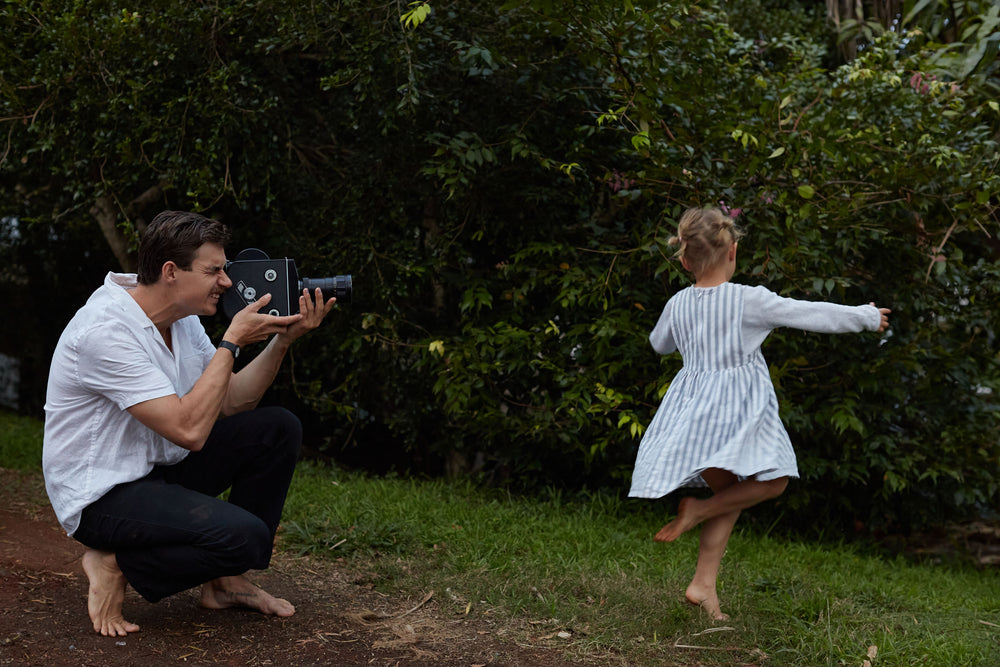 Nich Zalmstra filming his daughter dancing with his retro camera