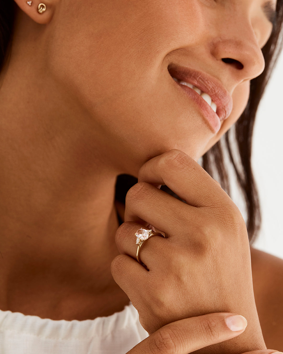 A model wears an oval morganite trio ring