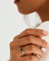 Sapphire square band stacked with a sapphire solitaire and fine square band, worn by a model
