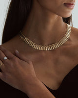 A woman wearing the Mabel Vintage Necklace. 
