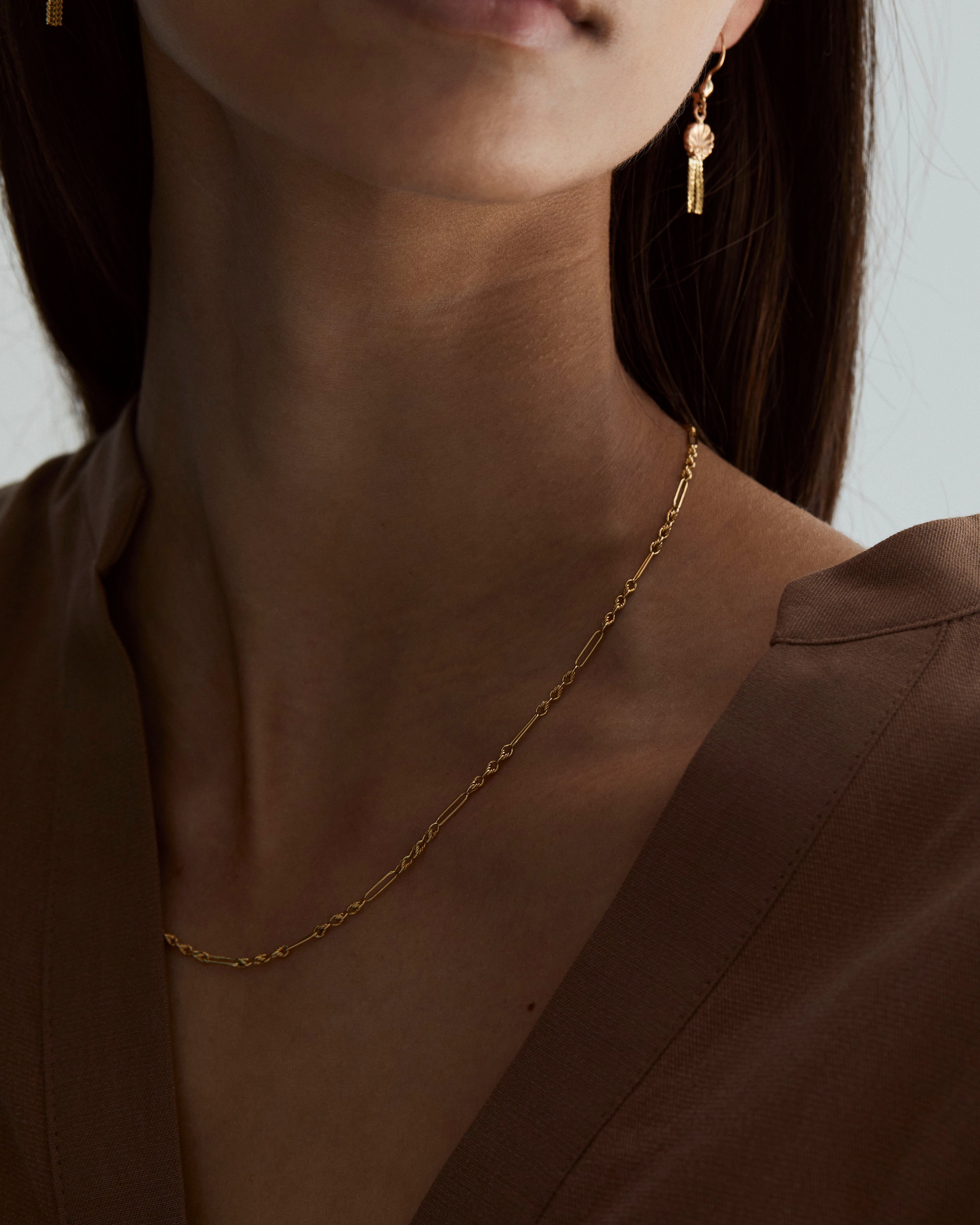 A woman wearing the Helena Vintage Necklace
