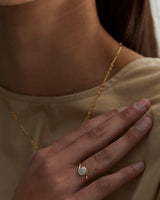 A close up on a woman wearing the Phoebe Vintage Ring | Diamonds.