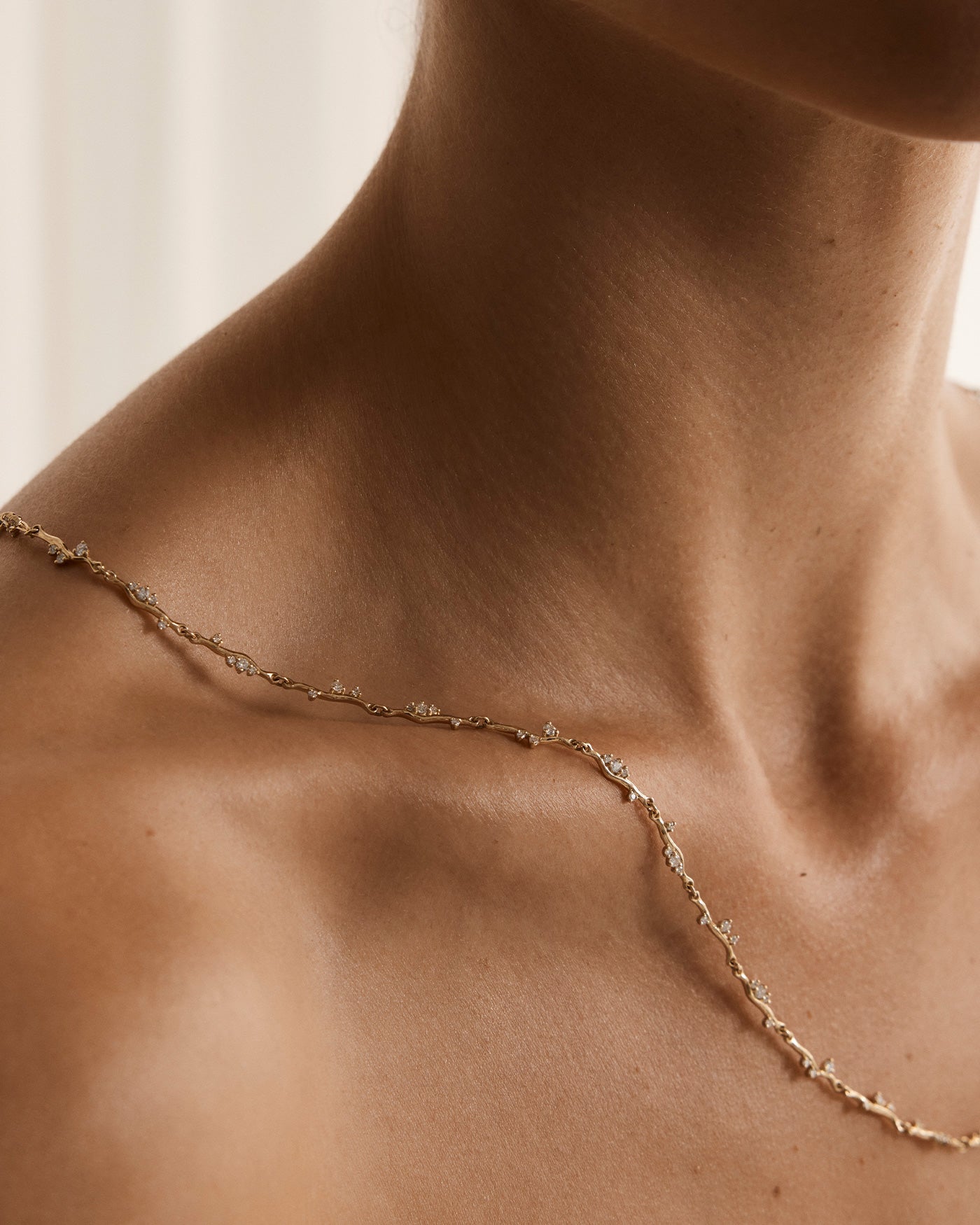 Model image of the ember diamond necklace being worn