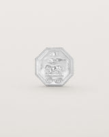 Sterling silver six pence coin engraved with a crest and initials