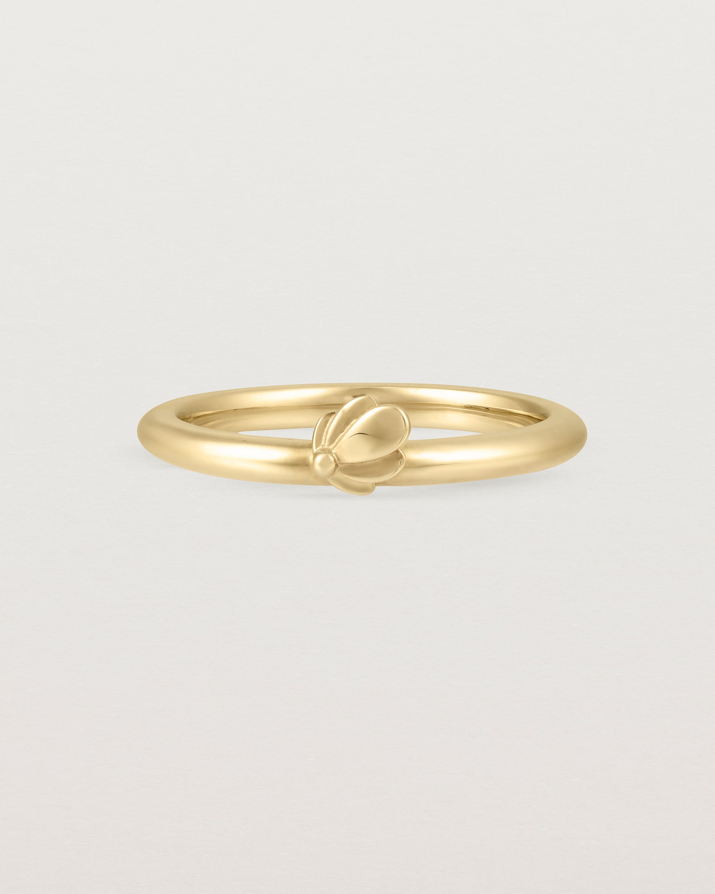 Front view of the Aeris Stacking Ring in yellow gold.