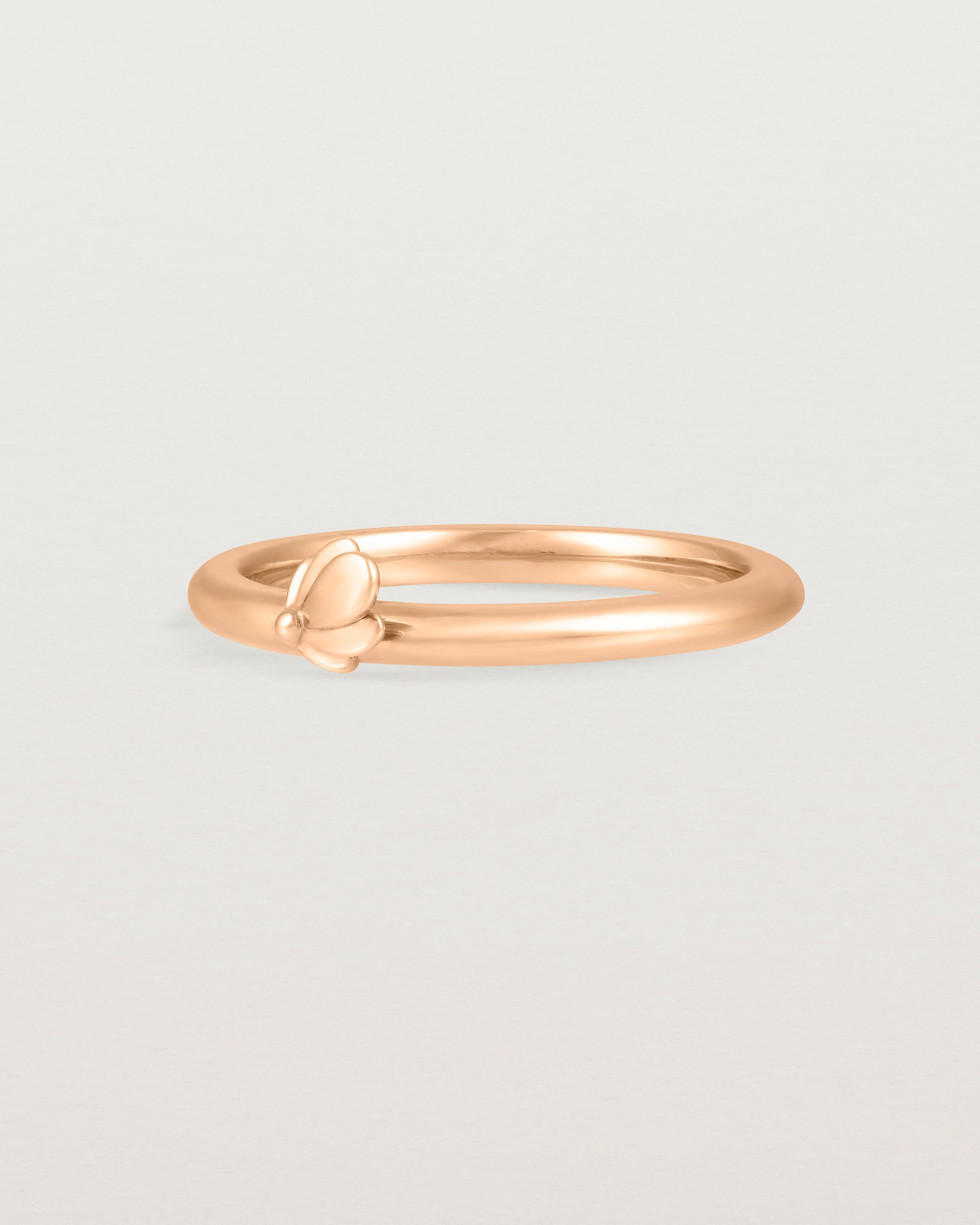 Angled view of the Aeris Stacking Ring in Rose Gold.