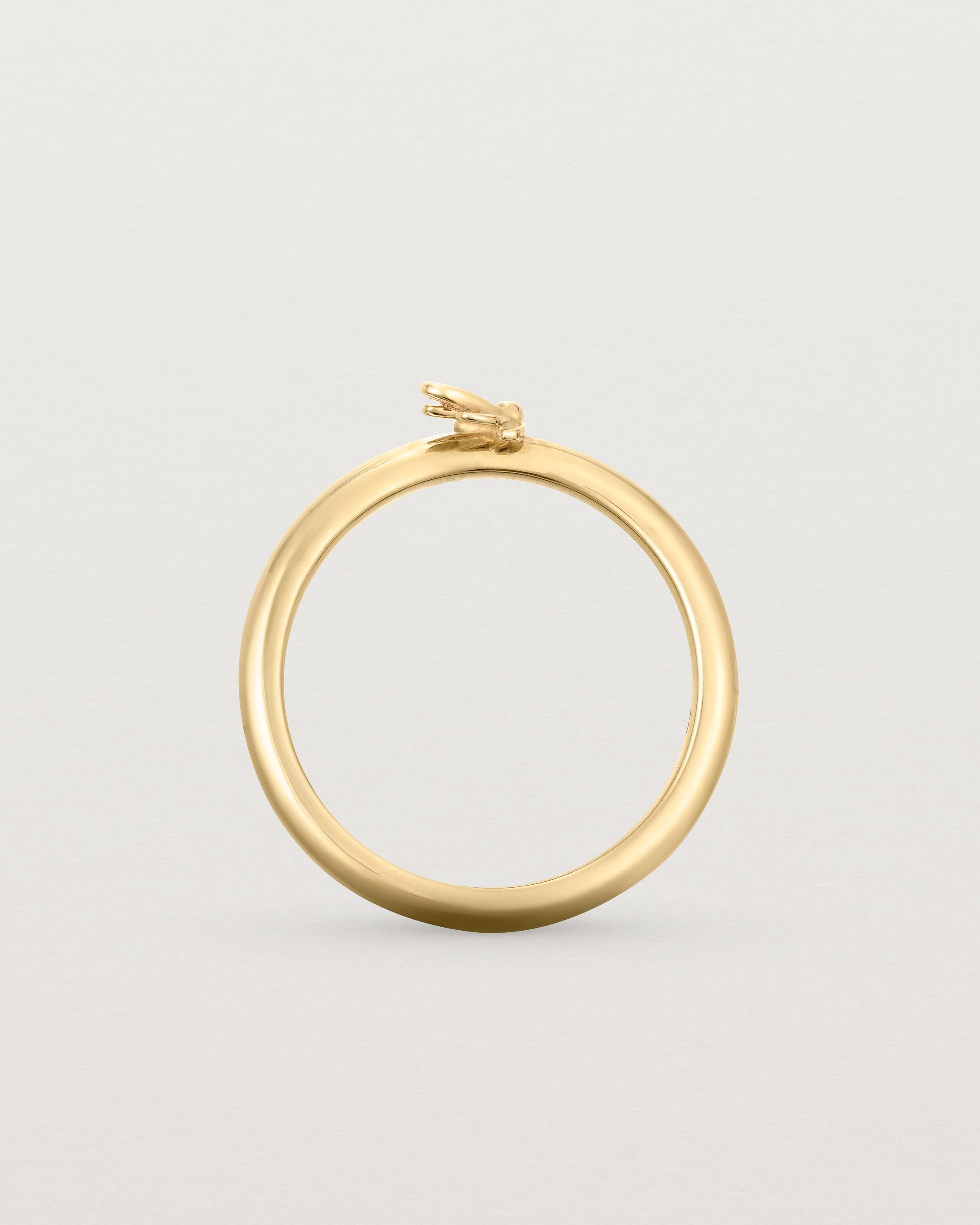 Standing view of the Aeris Stacking Ring in yellow gold.