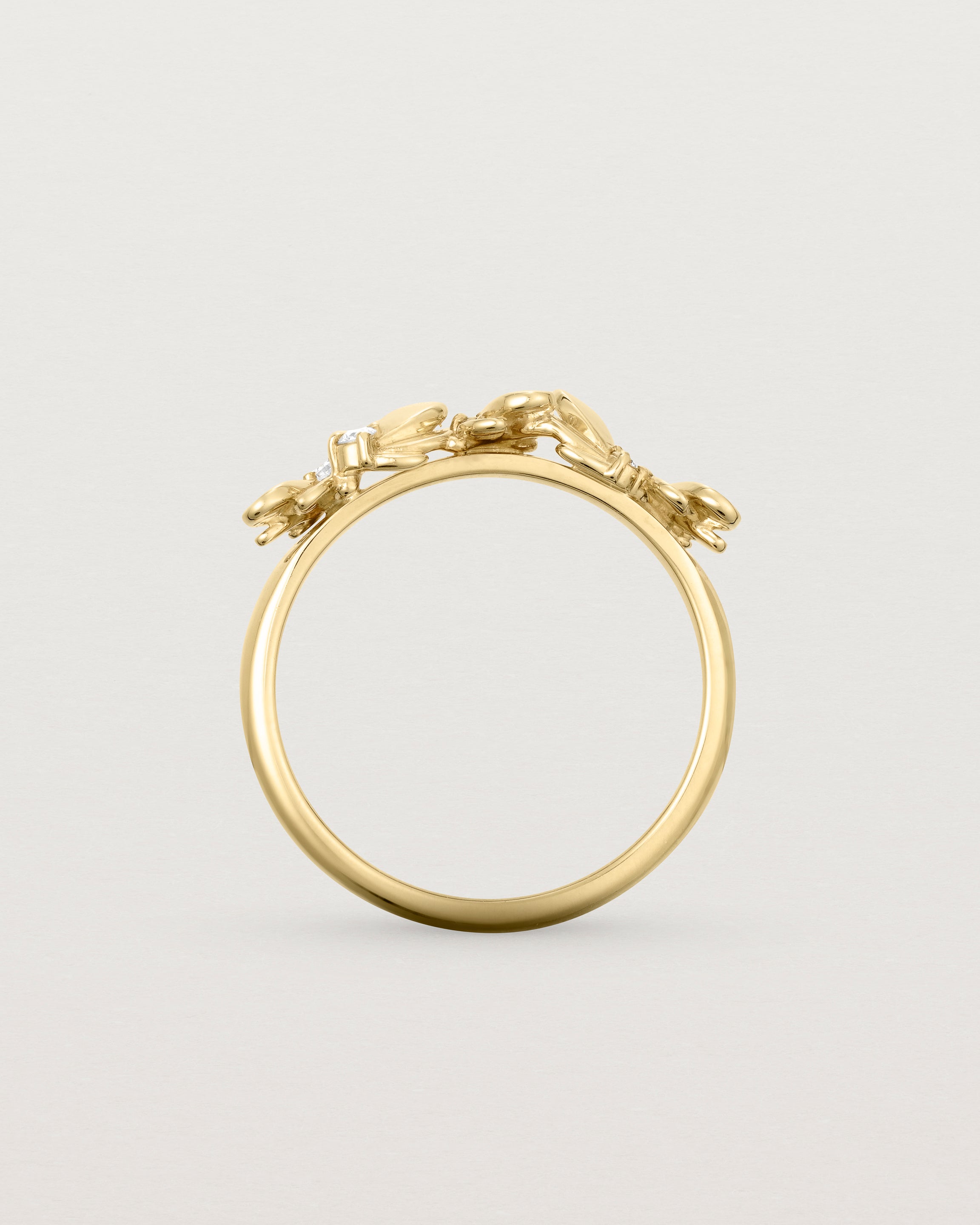 Standing view of the Aeris Wrap Ring | Diamonds in Yellow Gold.