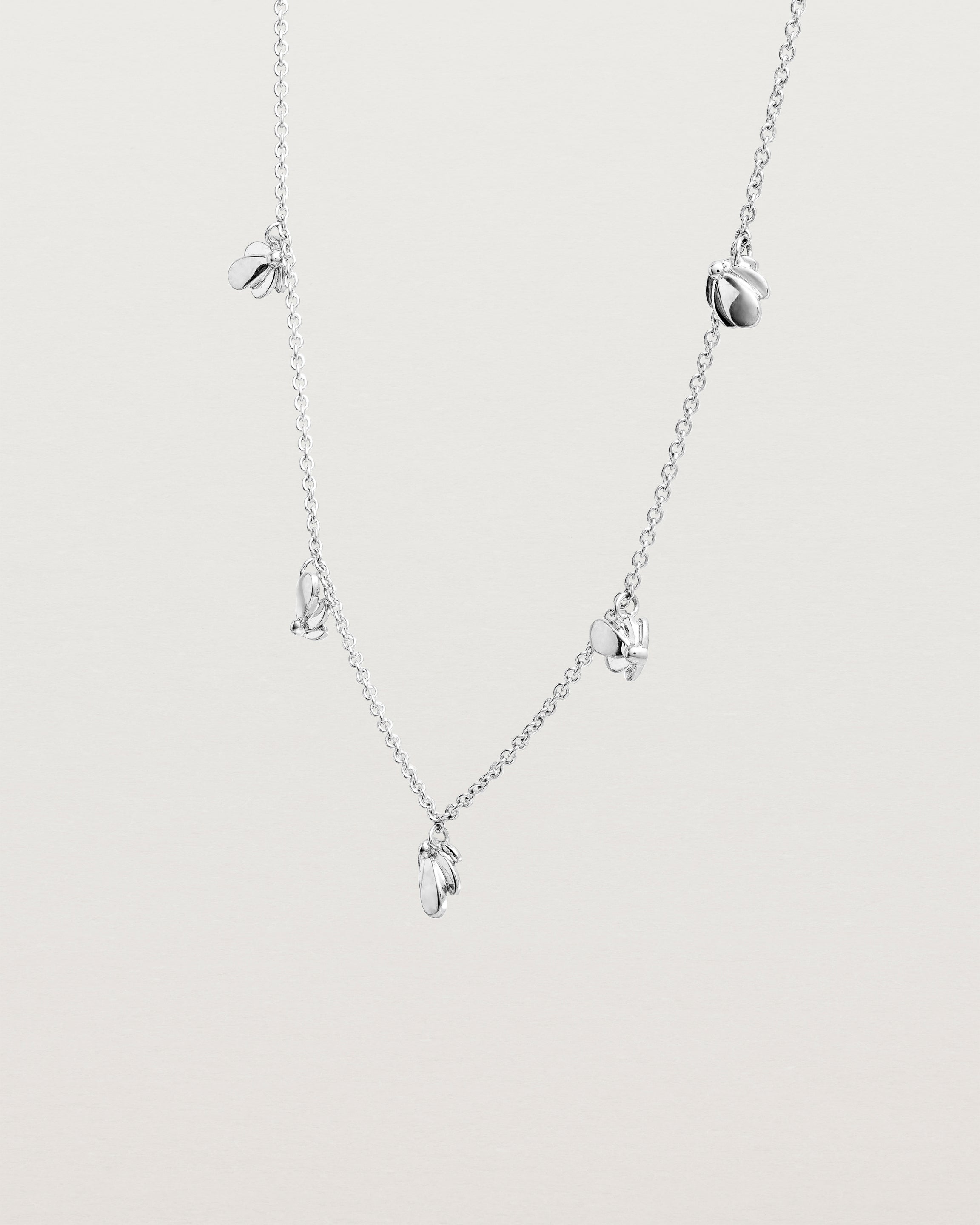 Angled view of the Aeris Charm Necklace in Sterling Silver.
