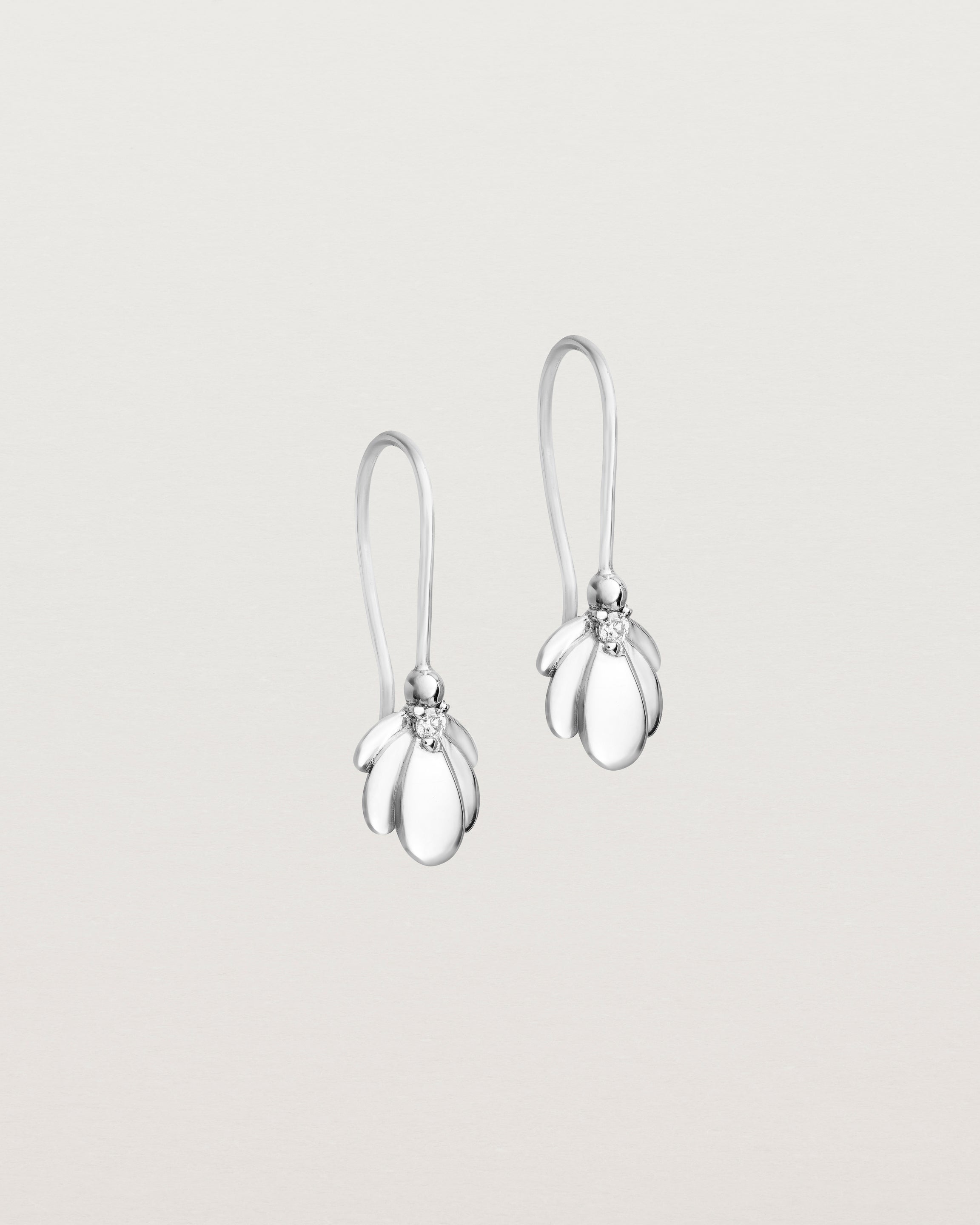 Angled view of the Aeris Earrings | Diamond | White Gold.