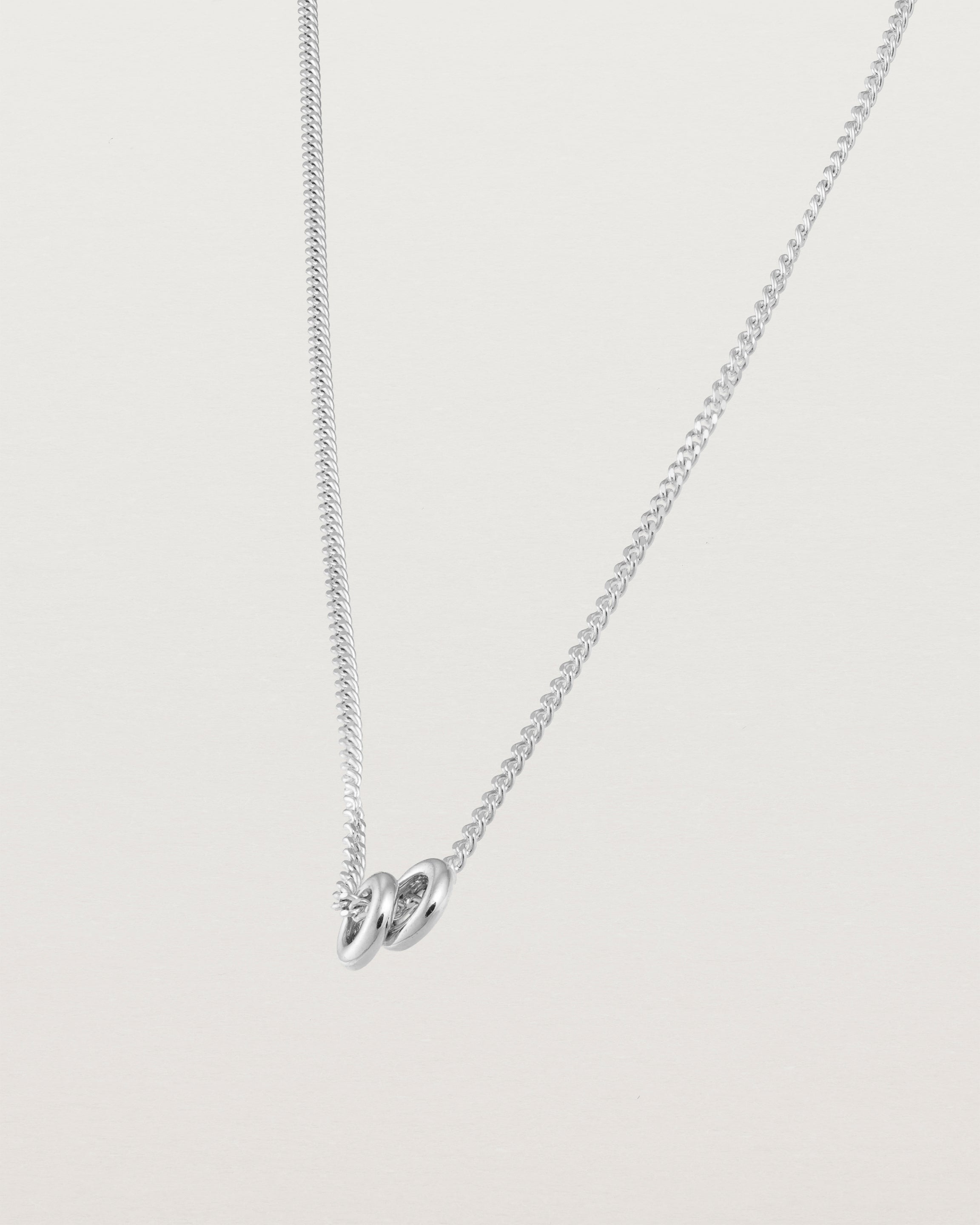 Aether necklace in white gold with two round charms