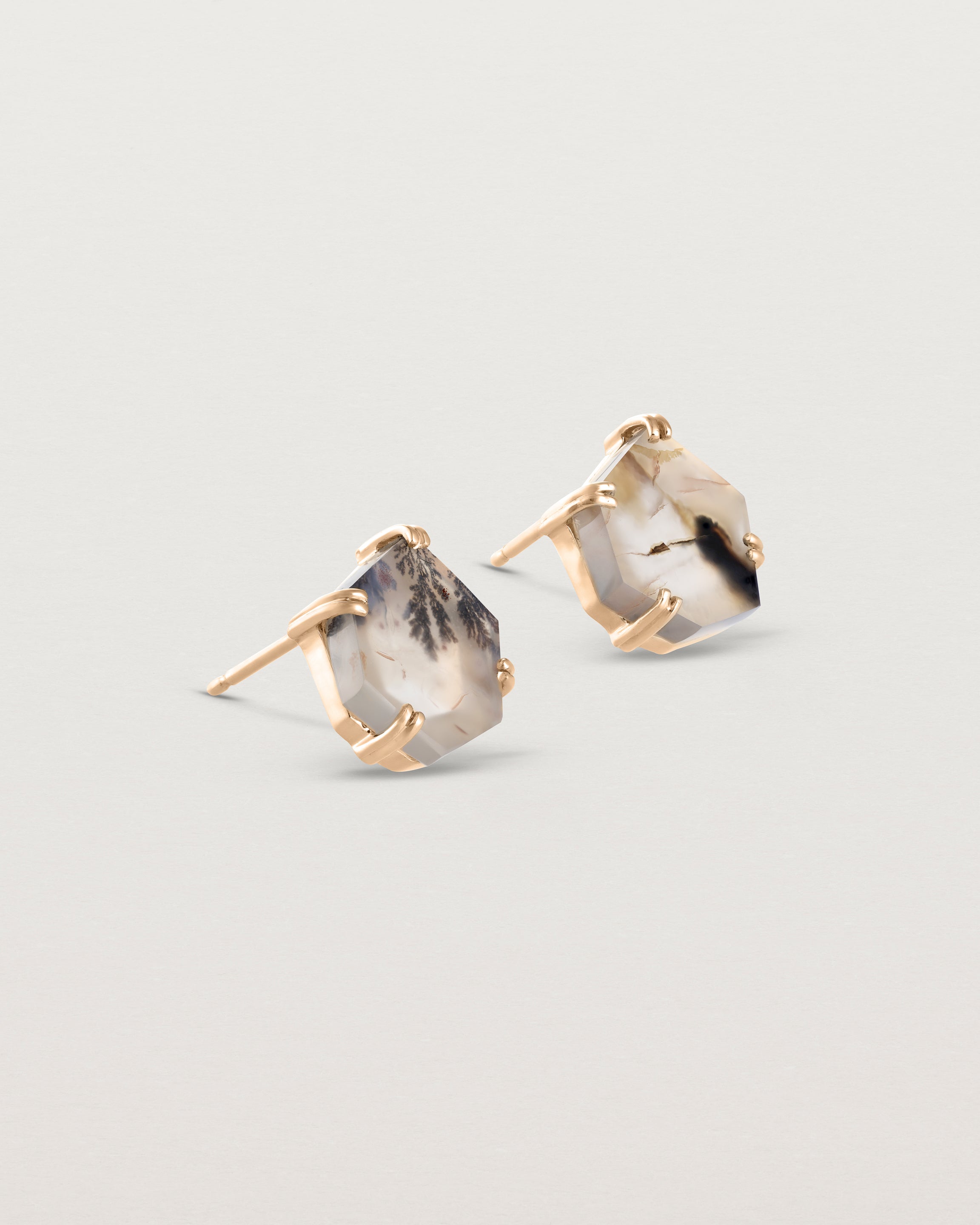 Angled view of the Agate Studs in rose gold.