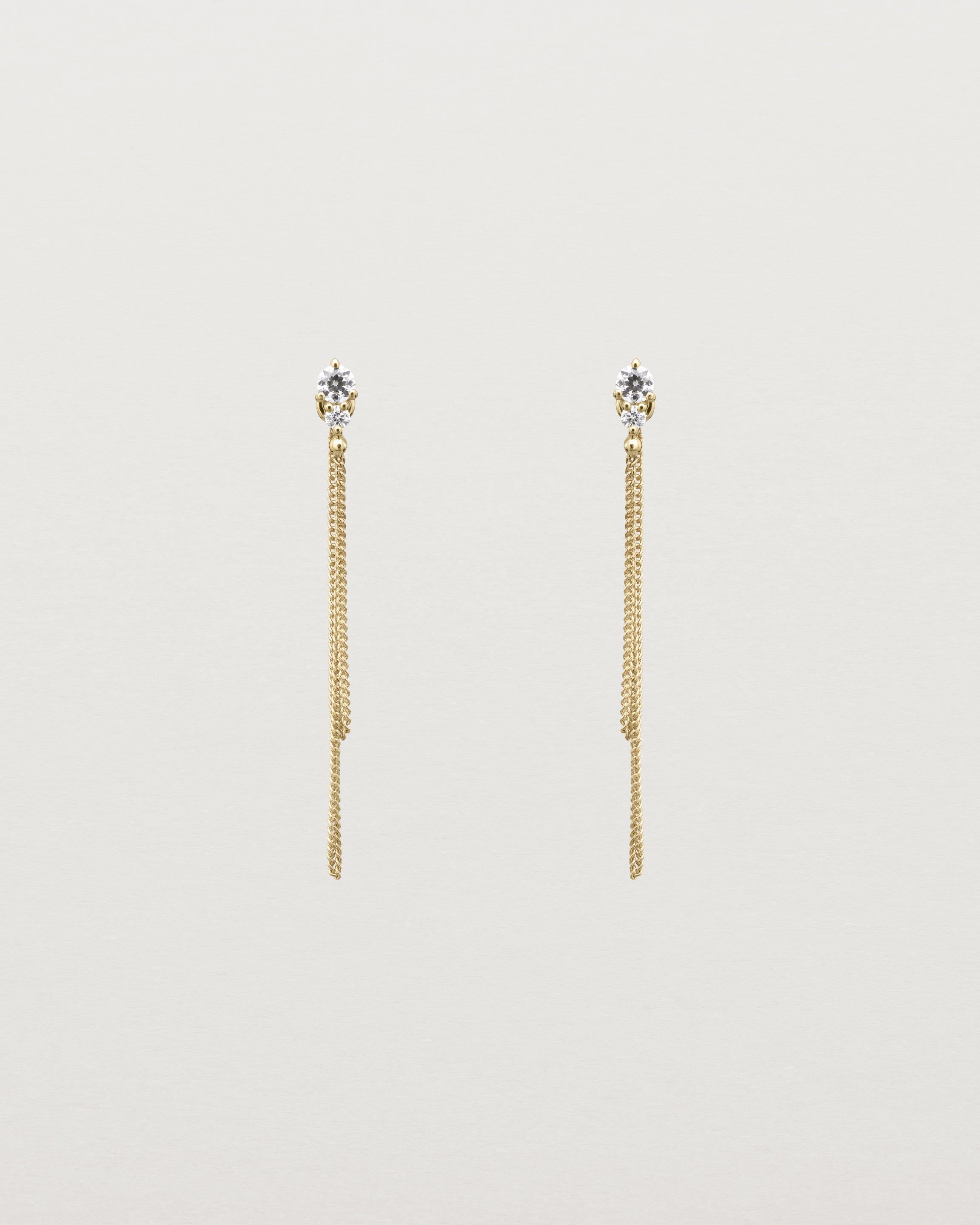 Front view of the Aiona Loop Studs | Diamonds in yellow gold.