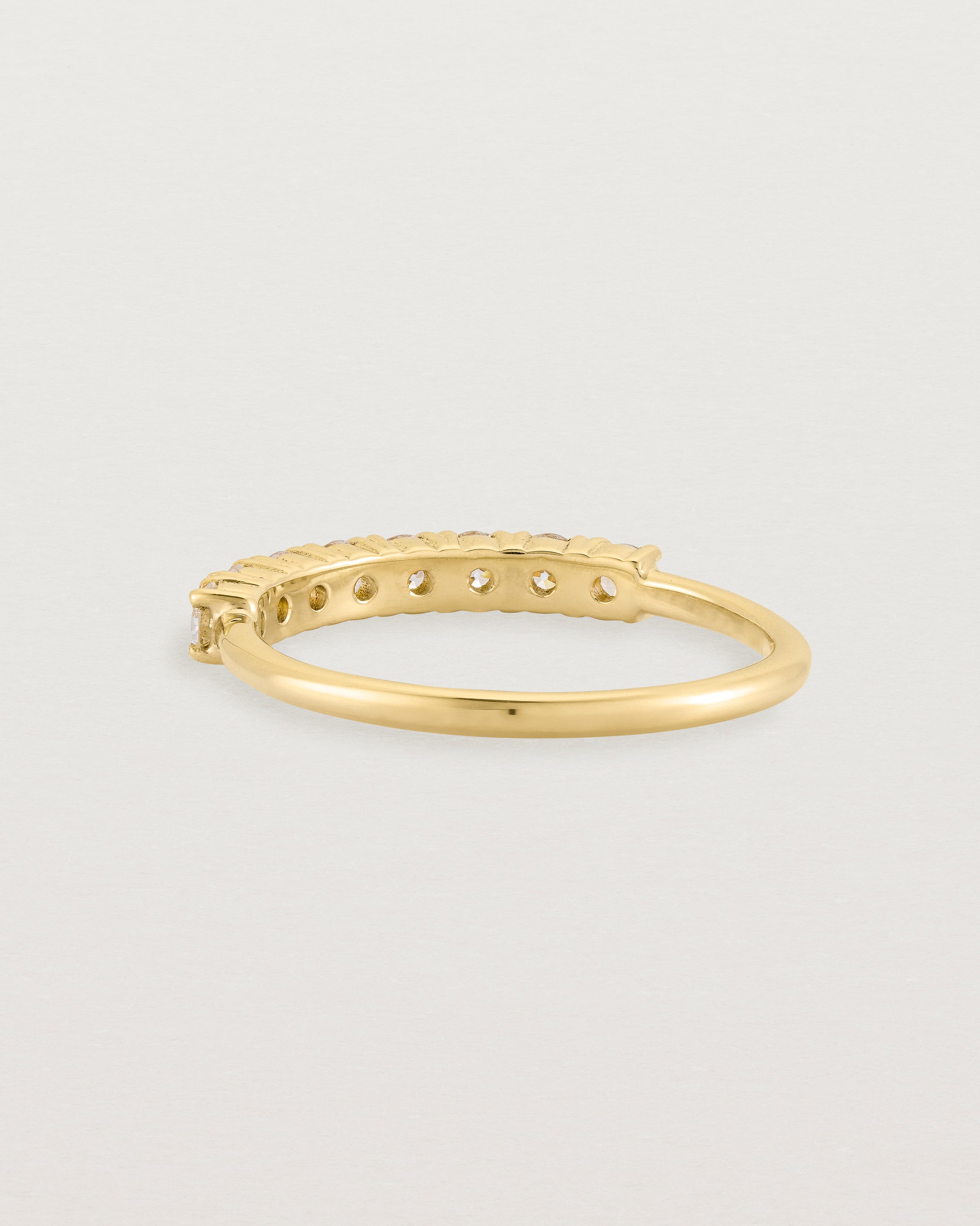 yellow Gold Diamond ring featuring seven white diamonds