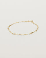 The Anam Charm Bracelet in yellow gold.