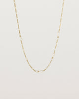 The Anam Charm Necklace in yellow gold.
