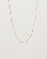 The Anam Charm Necklace in yellow gold.