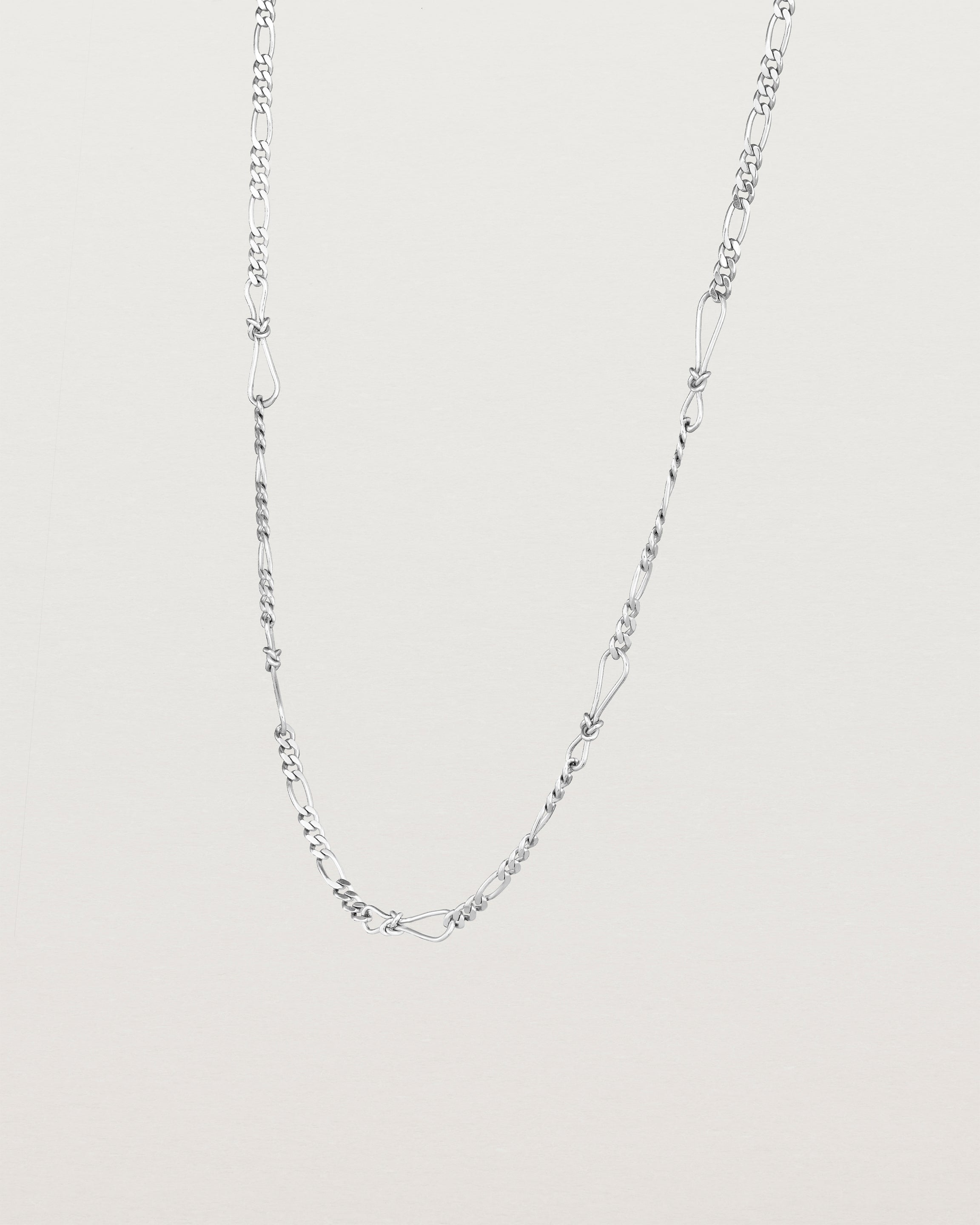Angled view of the Anam Charm Necklace in Sterling Silver.