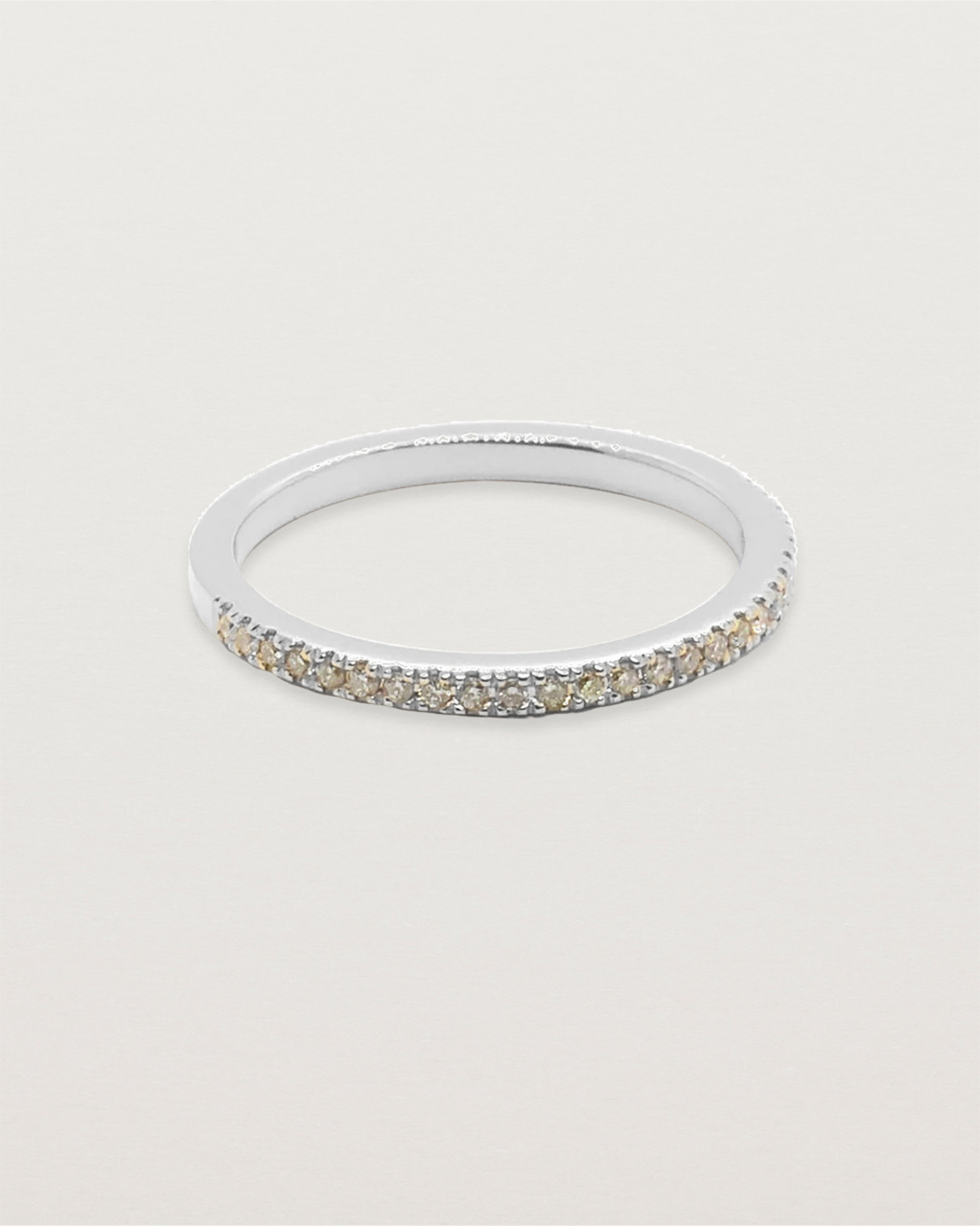 Front view of Annie band with champagne diamonds in white gold